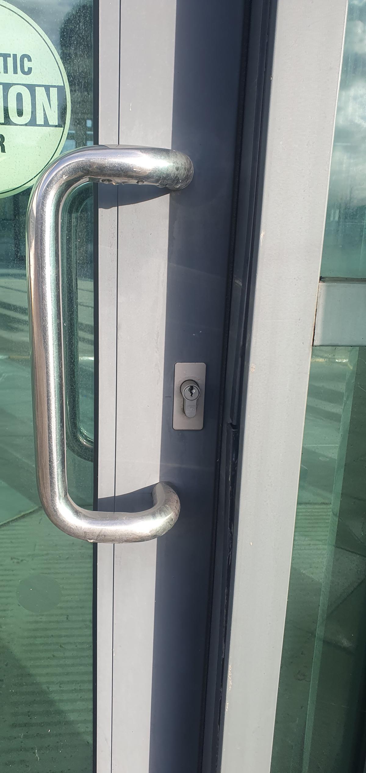 A commercial building that has a locked door with out a key