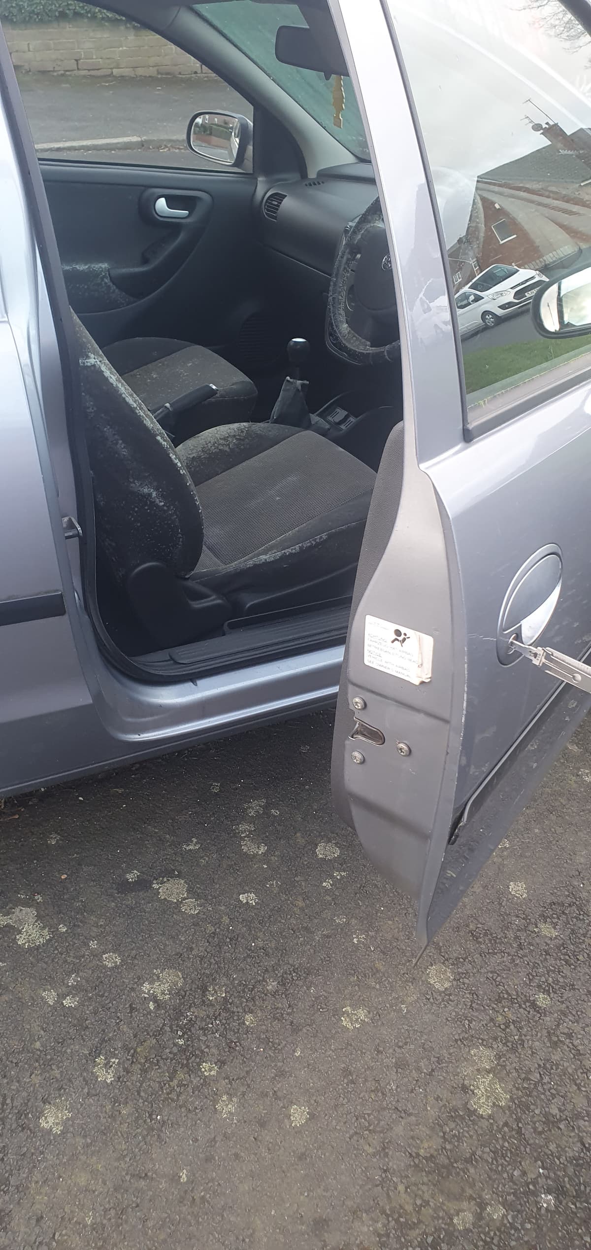 A car door unlocked by AD locksmithing
