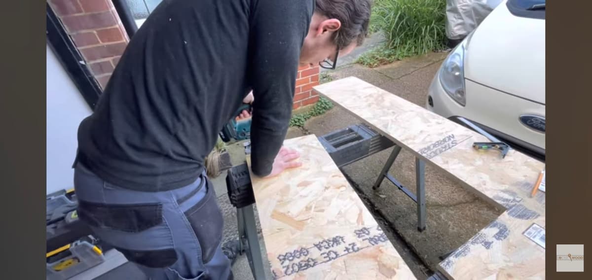 A picture of Ant from AD locksmiths fixing a door