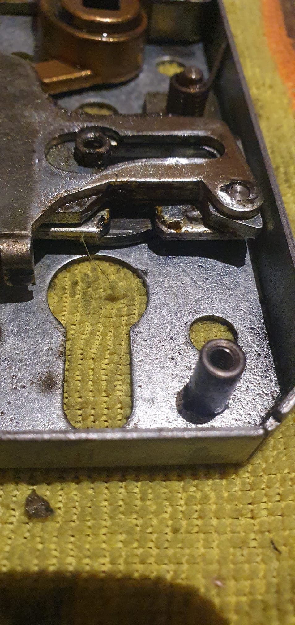 Disassembled mortice lock showing internal mechanism and levers