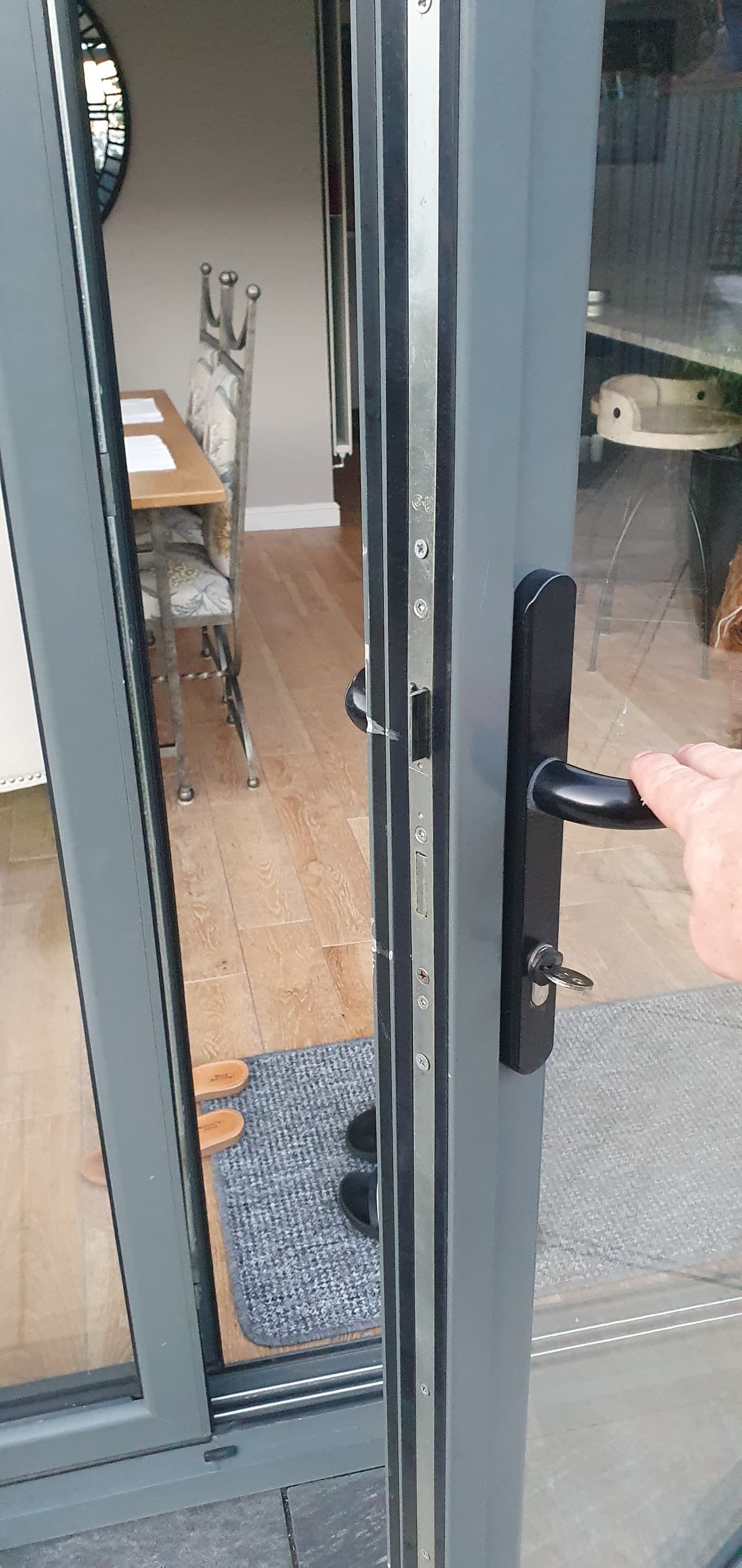 A home door being opened by AD locksmithing