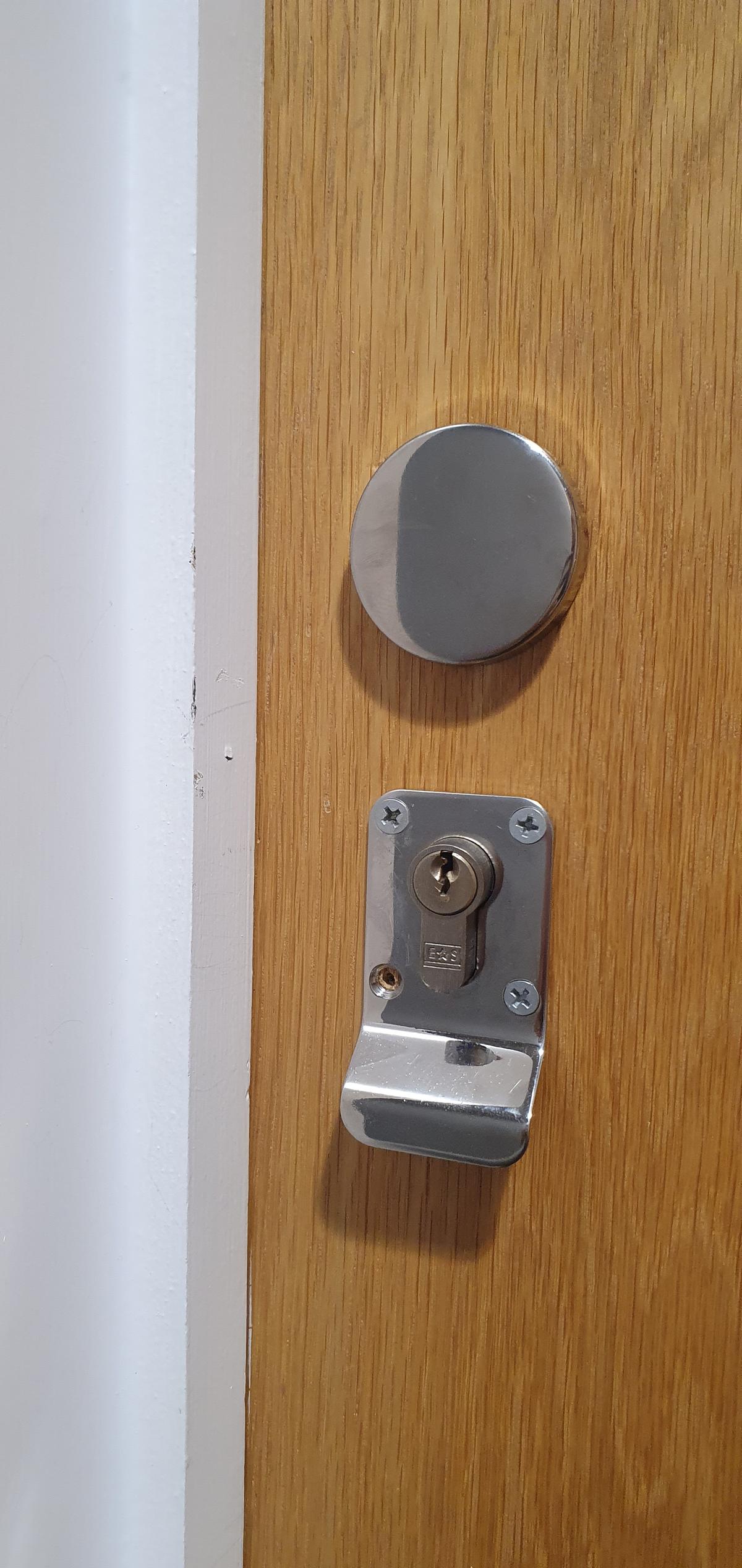A picture of a lock that has been open in a emergency lockout