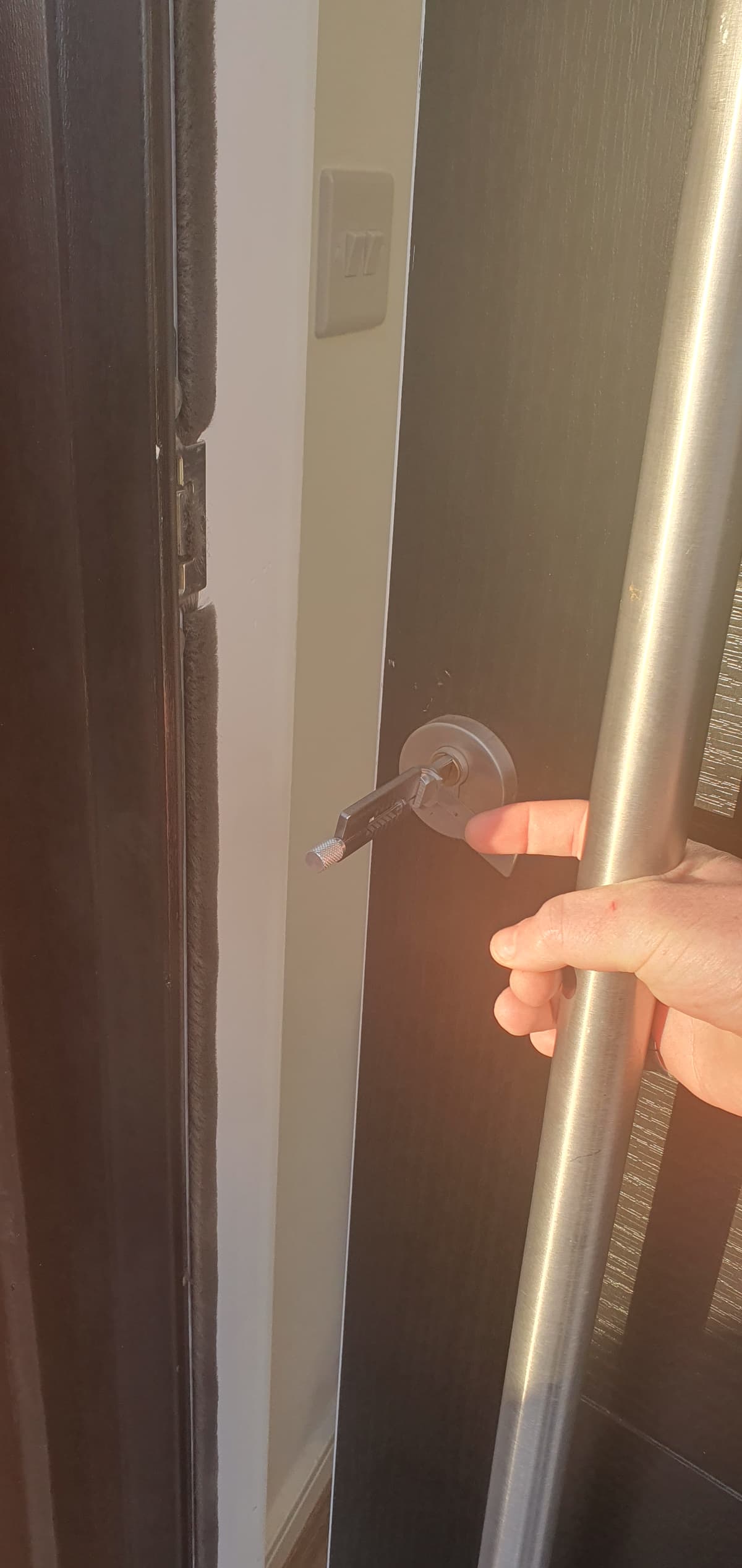 Emergency Locksmith Solutions Professional emergency locksmith completing a callout attending an emergency lockout